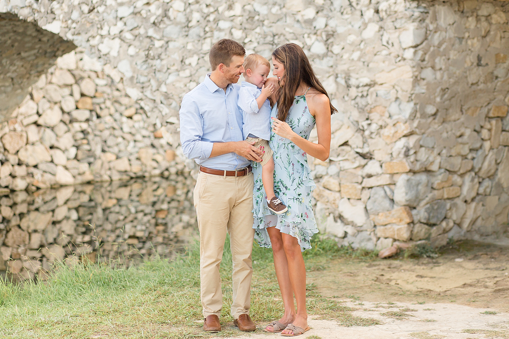 parents pose with toddler during McKinney family portraits