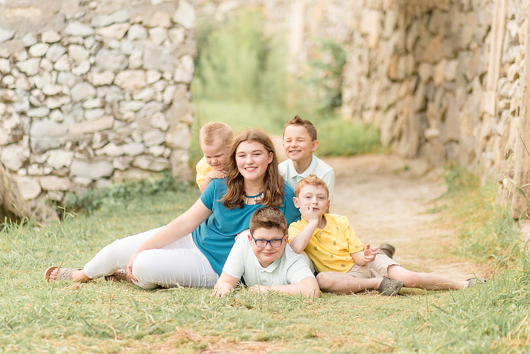 springtime family portraits at Adriatica Village for five siblings
