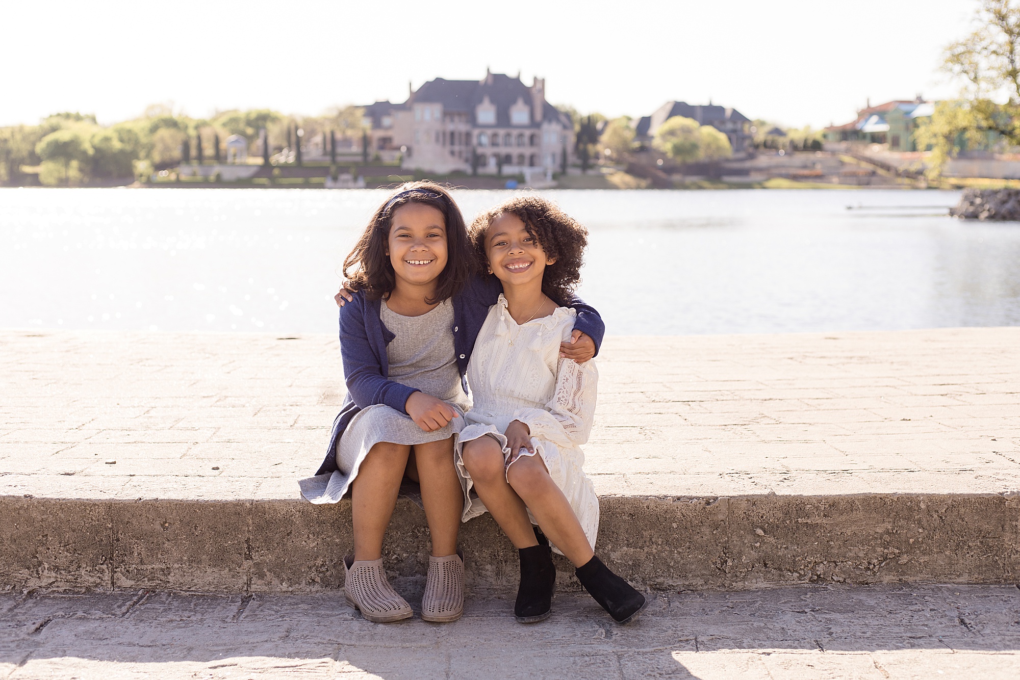 sisters hug for family portraits 