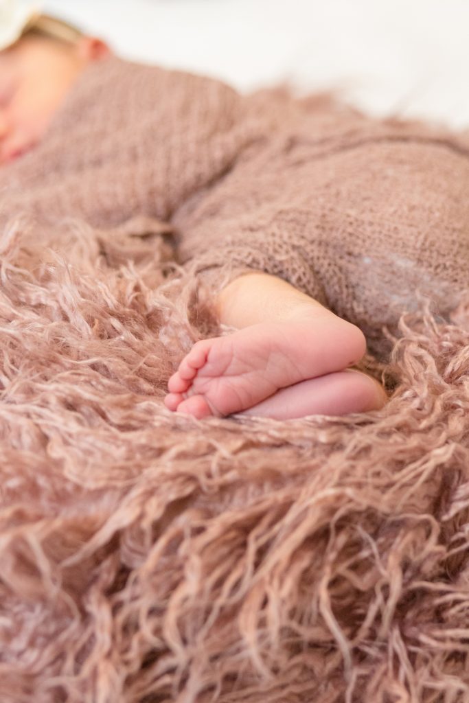 dallas newborn photographer captures newborn baby feet during dallas newborn session 