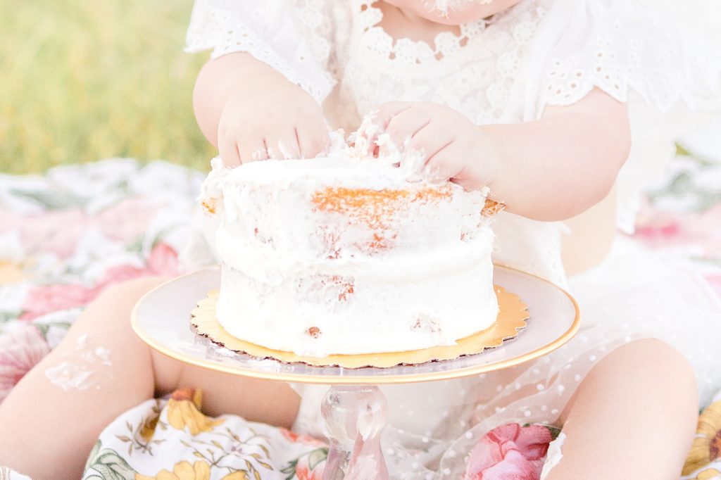 baby girl smash cake at adriatica village with McKinney milestone photographer 