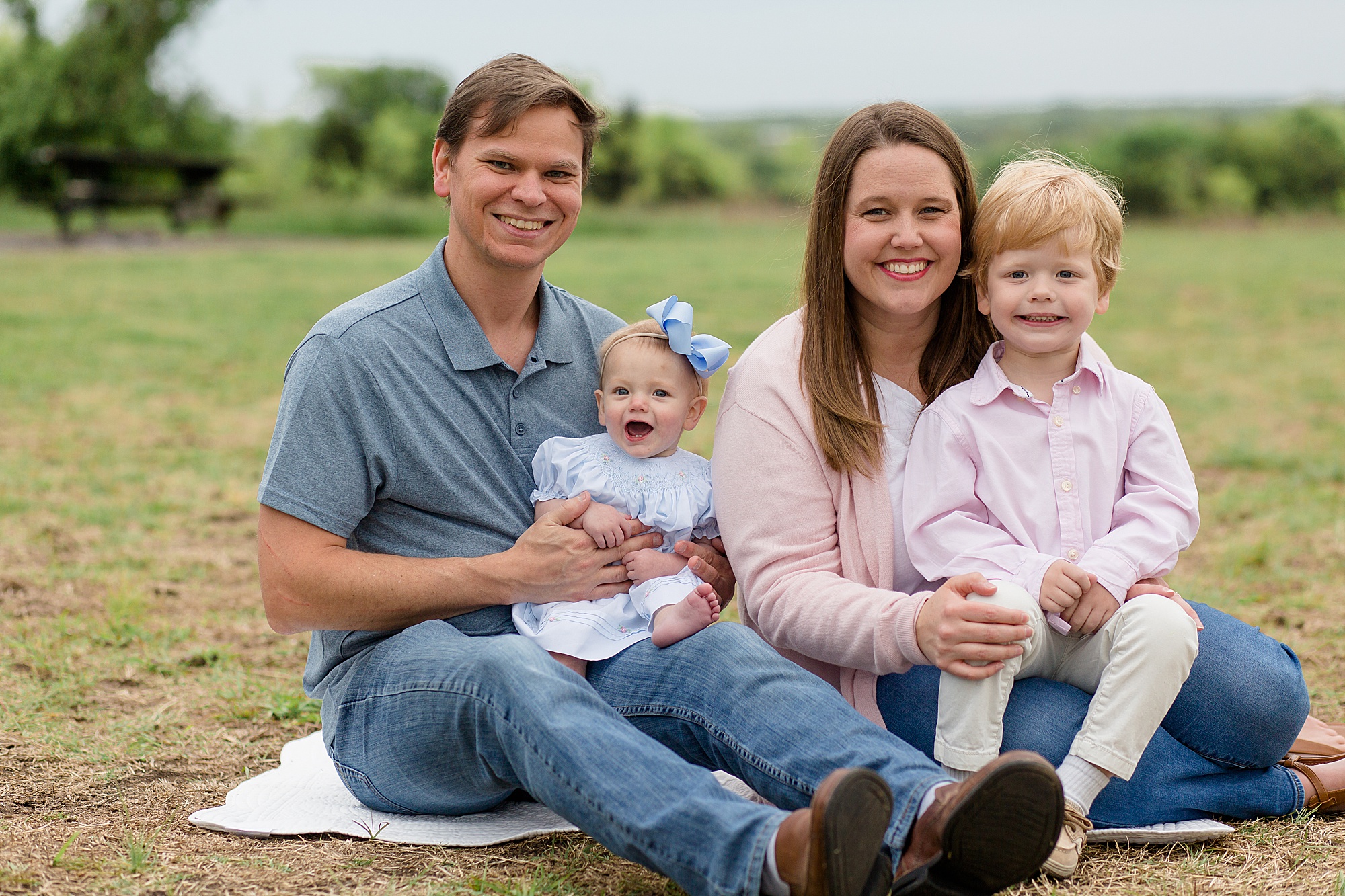 family poses at Erwin Park for family portrait session with Wisp + Willow Photography Co.