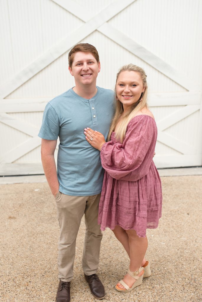 newly engaged couple poses during family session at Frisco Heritage Museum with Wisp + Willow Photography Co. 