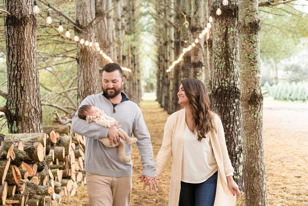 family of 3 walks together during family mini in Nashville TN with Wisp + Willow Photography Co. 