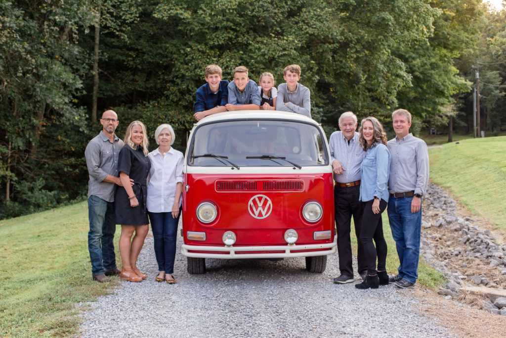 Extended family session on family property around red antique truck with nashville family photographer Wisp + Willow Photography Co. 