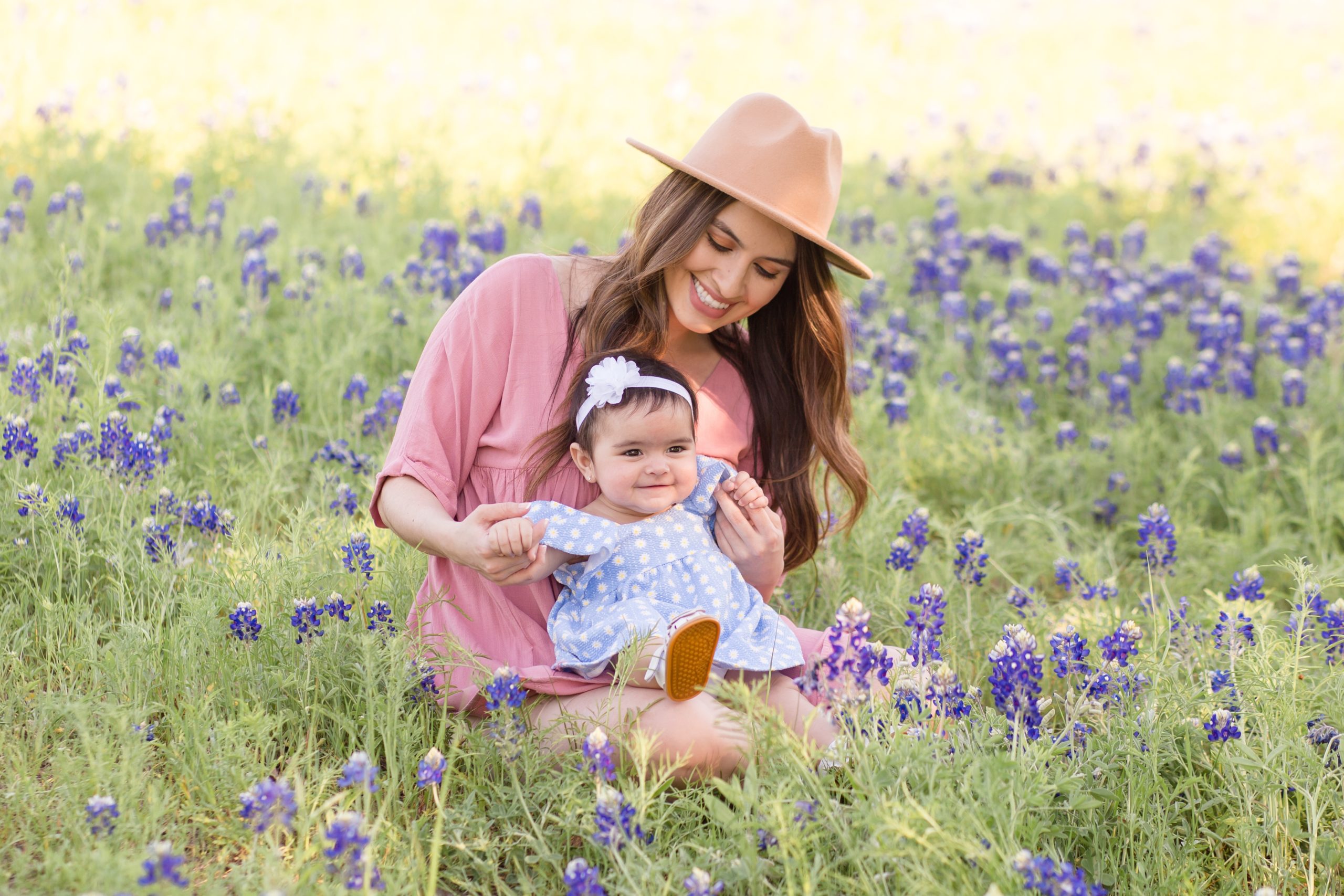 mom plays with baby girl during mommy and me session with wisp + willow photography co. Click to see more on the blog!