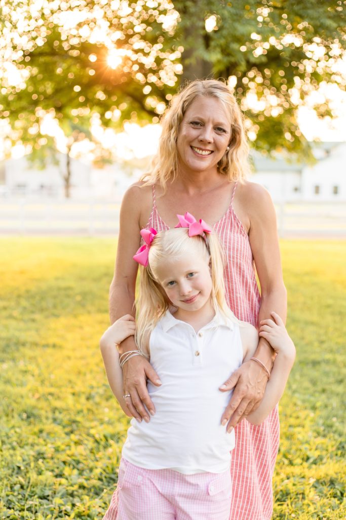 Mom and daughter pose for mommy and me session at Harlinsdale Farm in Franklin, TN. Click to see more from this session shot by Wisp + Willow Photography Co.