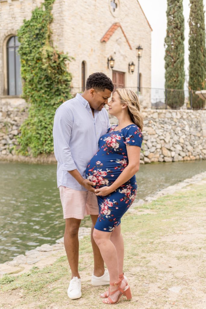 McKinney maternity photographer captures couple expecting baby girl at Adriatica Village