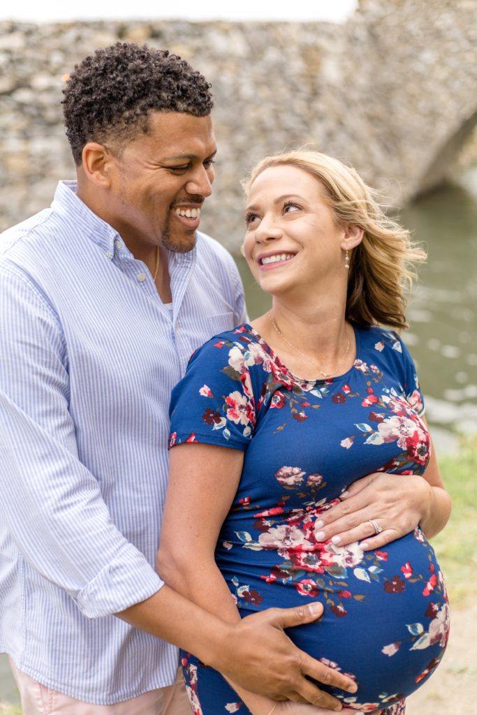 McKinney maternity photographer captures couple expecting baby girl at Adriatica Village 