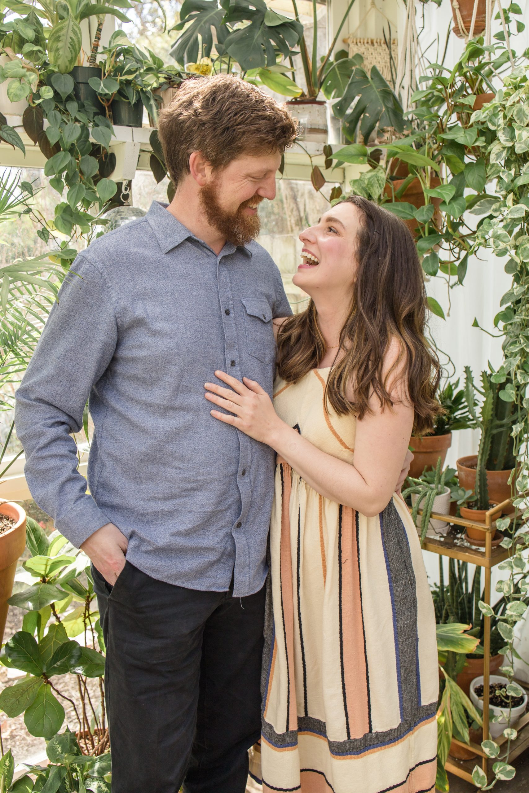 Parents pose during family mini session at East Nash Greenhouse in Nashville, TN with family photography team Wisp + Willow Photography Co. Click to see more from this set of minis live on the blog now! 