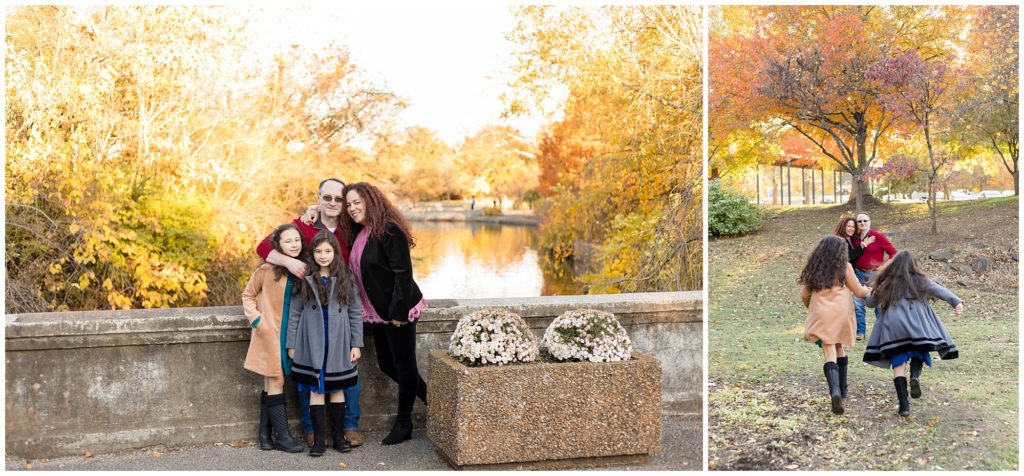 A family of 4 are standing on a stone bridge with gorgeous trees and a lake in the background. The family is also seen standing in a beautiful open field with gorgeous trees covered in amazing fall-colored leaves. Mom is wearing a pink shirt and a fitted black jacket and black leggings. Dad is wearing a red long-sleeved pullover shirt and blue jeans with cowboy boots. The first sister is wearing a tan peacoat and teal dress and black boots. The second sister is wearing a grey peacoat with black trim, a royal blue dress, and black boots. 