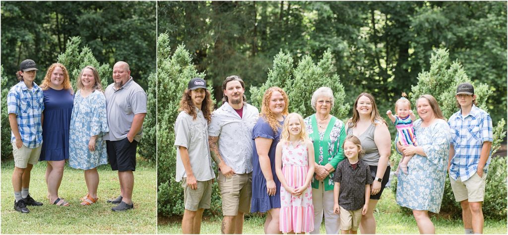 Family of 10 is standing in front of a gorgeous tree line. The family is dressed in various shades of blue as well as pink and green. 