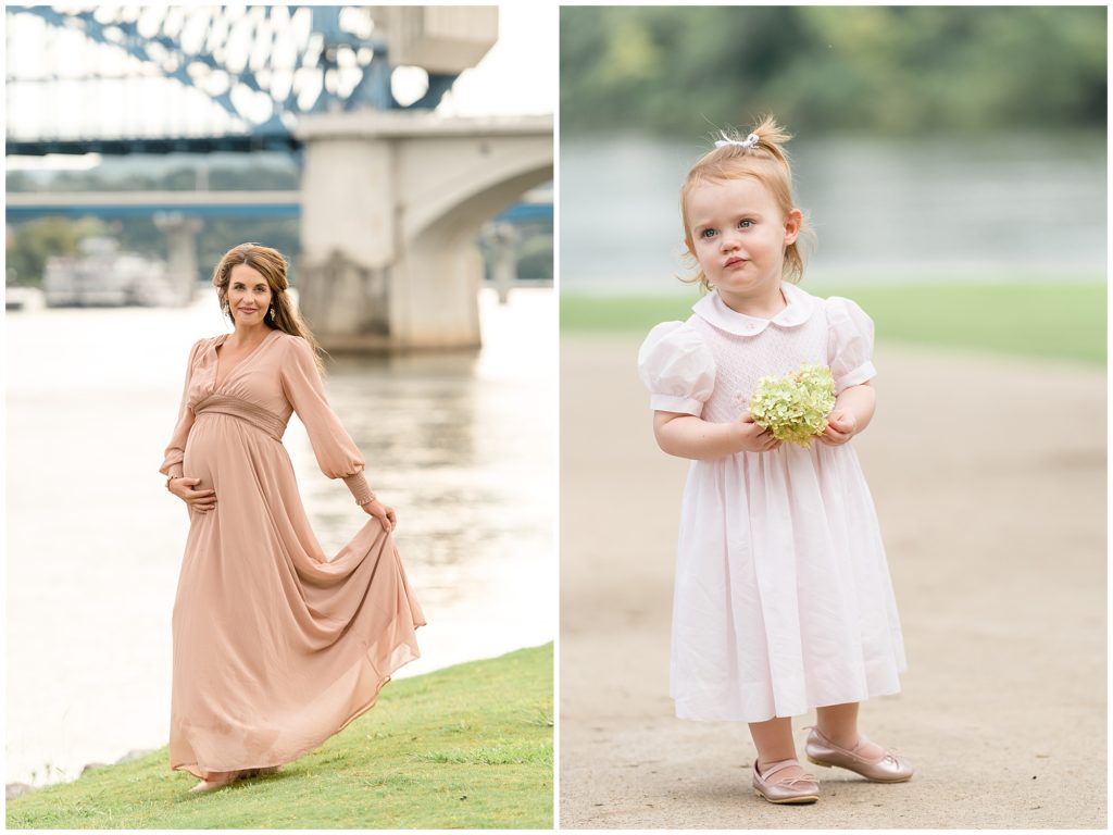 Pregnant woman in beautiful flowy blush dress holds into hem in front of the Tennessee River in Coolidge Park. Little girl in pale pink dress holds a bunch of flowers on sidewalk in Chattanooga, TN during family maternity session with Wisp + Willow Photography Team. 