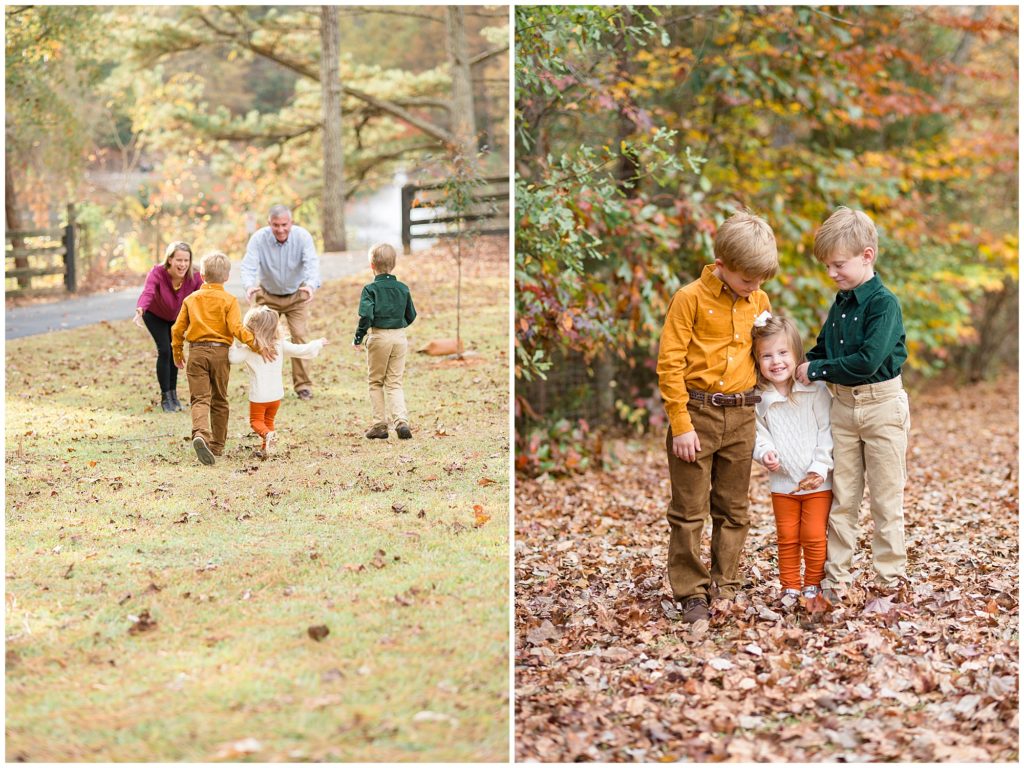 3 kids run towards parents to give them a hug in field with fence behind at Sims Lake Park. 2 brothers in yellow and green button downs hug little sister in white sweater and orange pants while standing in bed of fall leaves. 