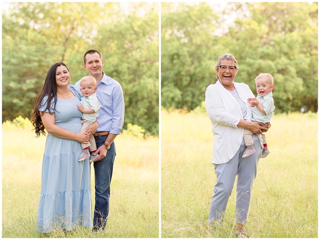 Grandson smiles with his Grandma during their family photography session in Plano, TX.  Mom and Dad stand as they hold 1 year old son at Arbor Hills Nature preserve.  Mom wears a blue dress, Dad wears a blue button down and jeans, and their son wears a green botton down and khakis.