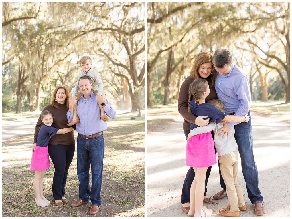 Mom and Dad take fall family portraits during their fall mini session with Savannah family photographer in Wormsloe.  They coordinate in outfits wearing neutral brown, blue, and cream and daughter wears a pop of hot pink with her skirt.