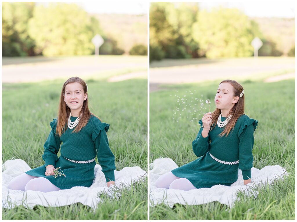 Young girl sits in the grass at Erwin Park in McKinney, TX with an emerald green dress that has a lace inseam at the waist.  She wears a pearl necklace and smiles at the camera for one image and then blows dandelions in the next image.