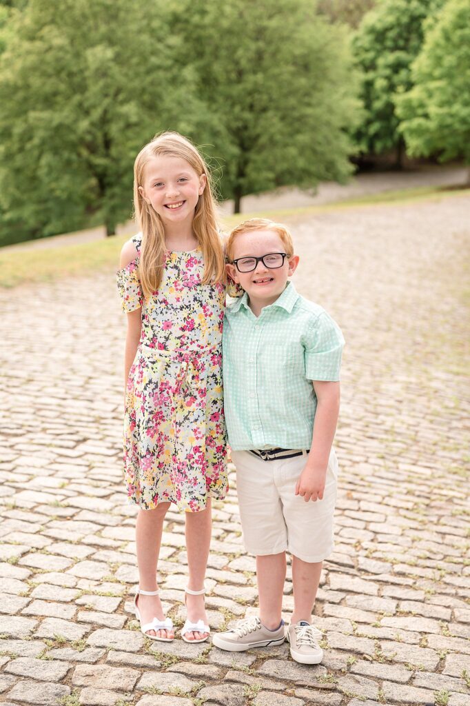 Brother and sister wear bright spring colors during their Richmond family portrait session with Wisp + Willow Photography Co.