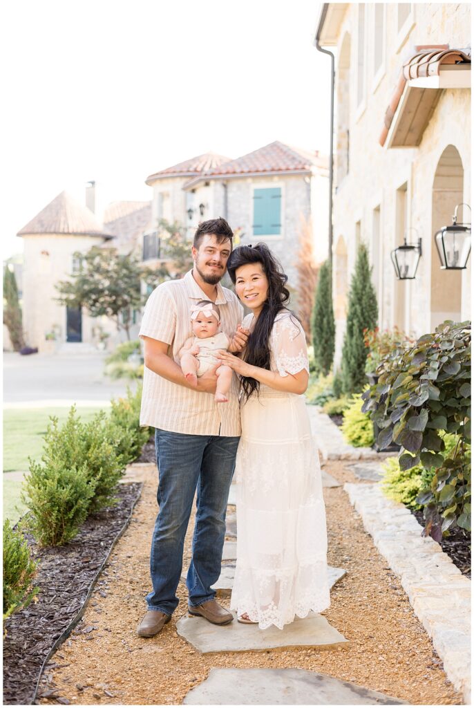 Family of 3 have an Adriatica family session at Adriatica village in McKinney, TX with Wisp + Willow Photography Co.  Click to see more of this family on the blog today!