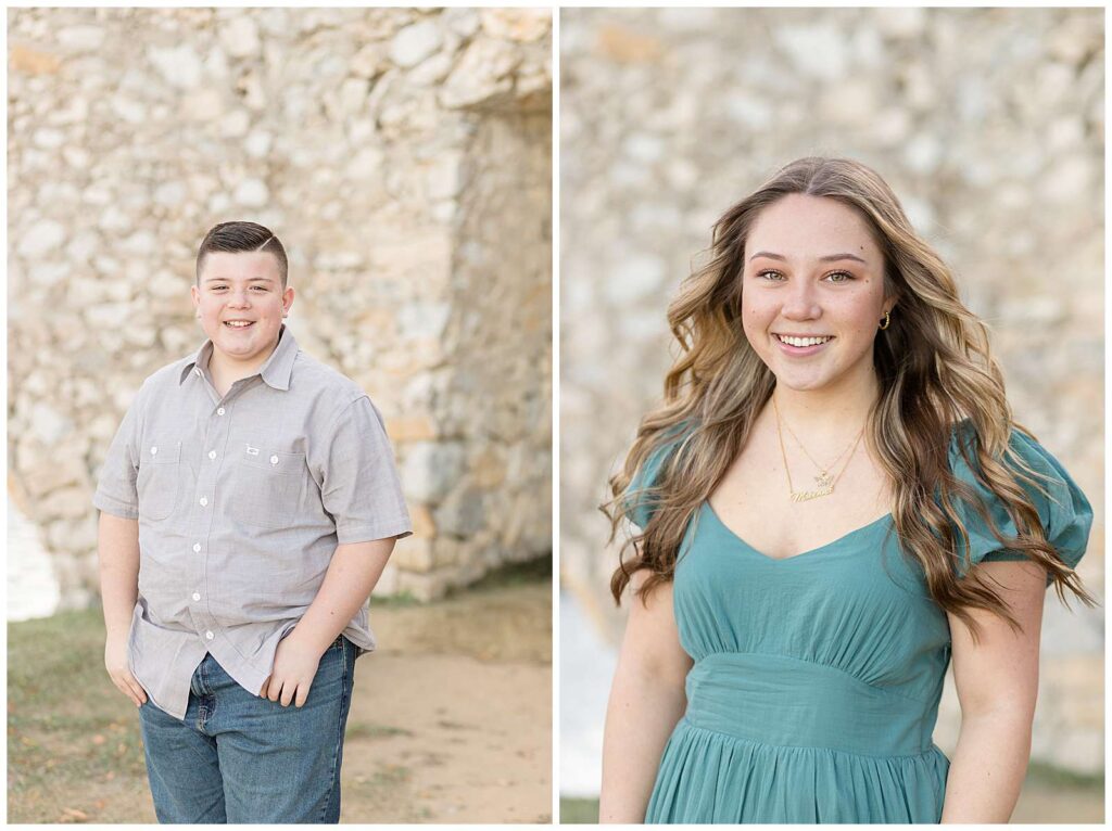 Two siblings, take an individual portrait during their family session at Adriatica Village.  The image on the left shows a teenage boy who wears jeans and grey button down shirt and smiles at the camera.  The image on the right shows a teenage girl who wears a teal dress with puff sleeves, curled hair, and a name necklace as she smiles at the camera.
