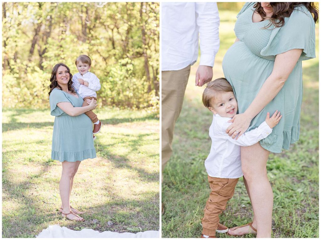 Mom wears a muted teal, short dress for her maternity session with her family.  Her toddler son wears a white button down shirt and a pair of cognac pants and shoes.  She holds him up on her belly for one image and the other image has her son standing and hugging her legs with his head just below her belly.
